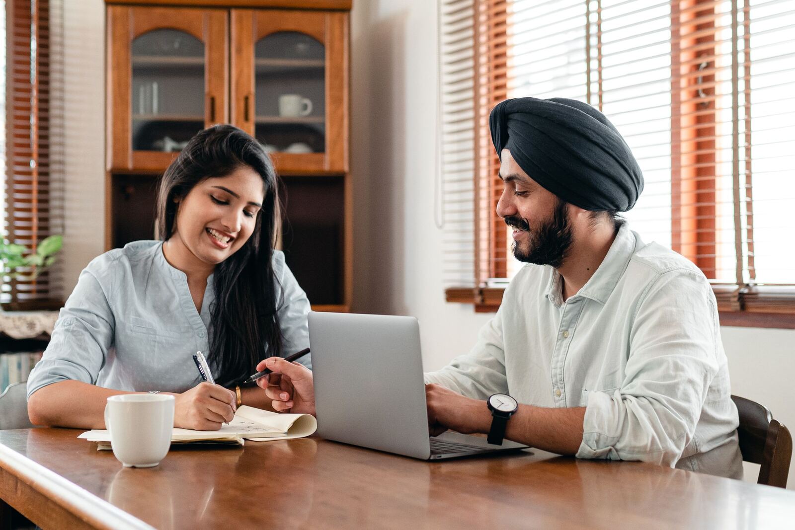 Indian marketing team reviewing a campaign plan together