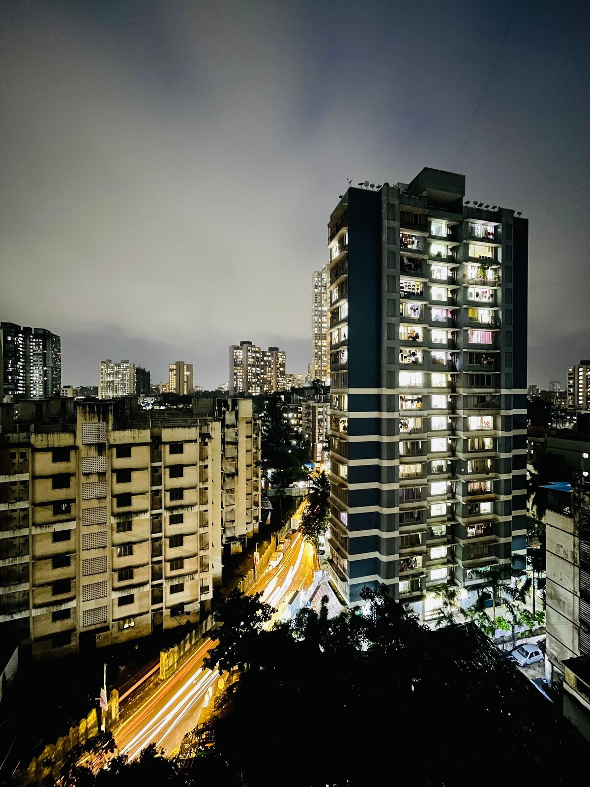 Modern Indian residential interiors and skyline at dusk